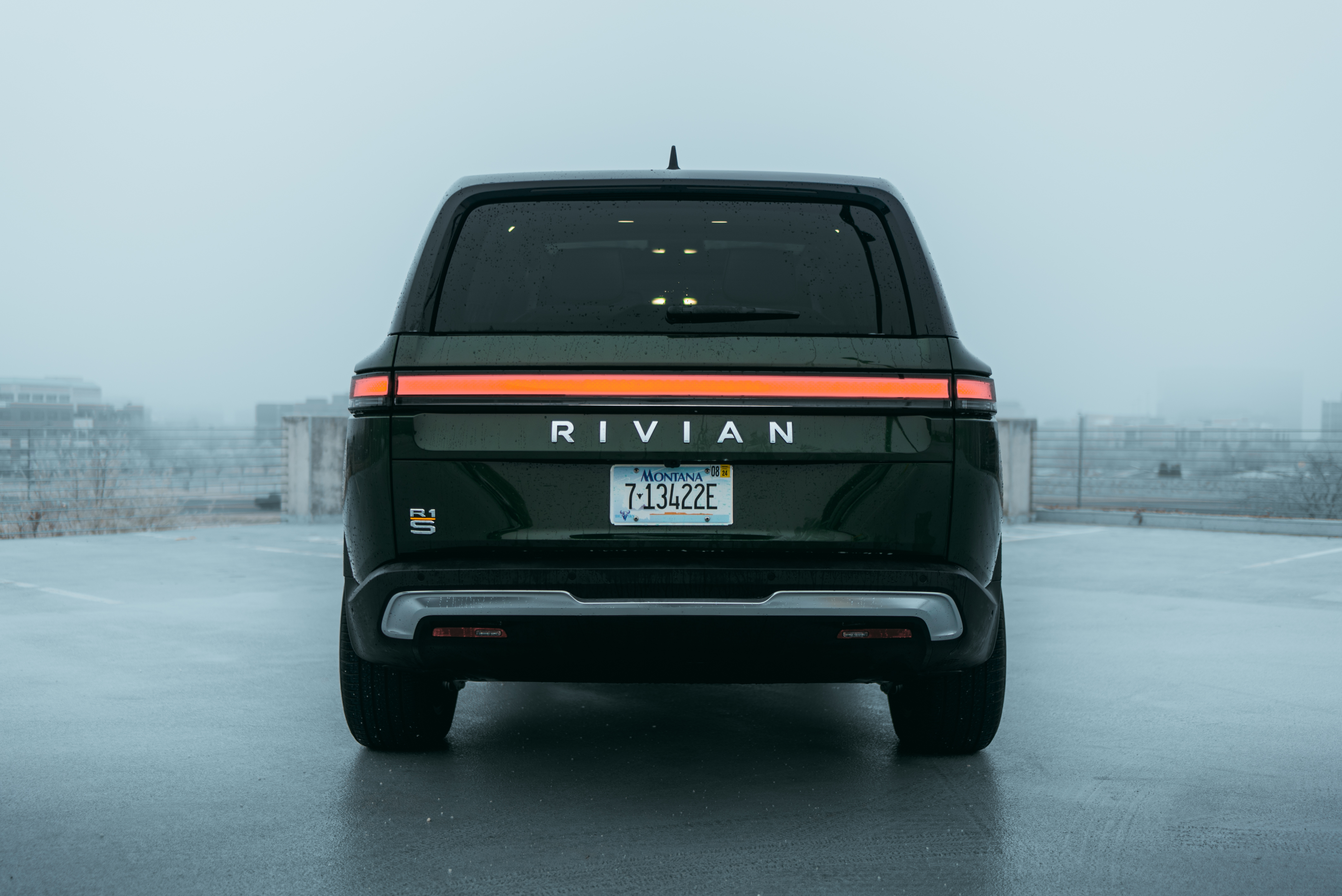 Green Rivian R1S rear view