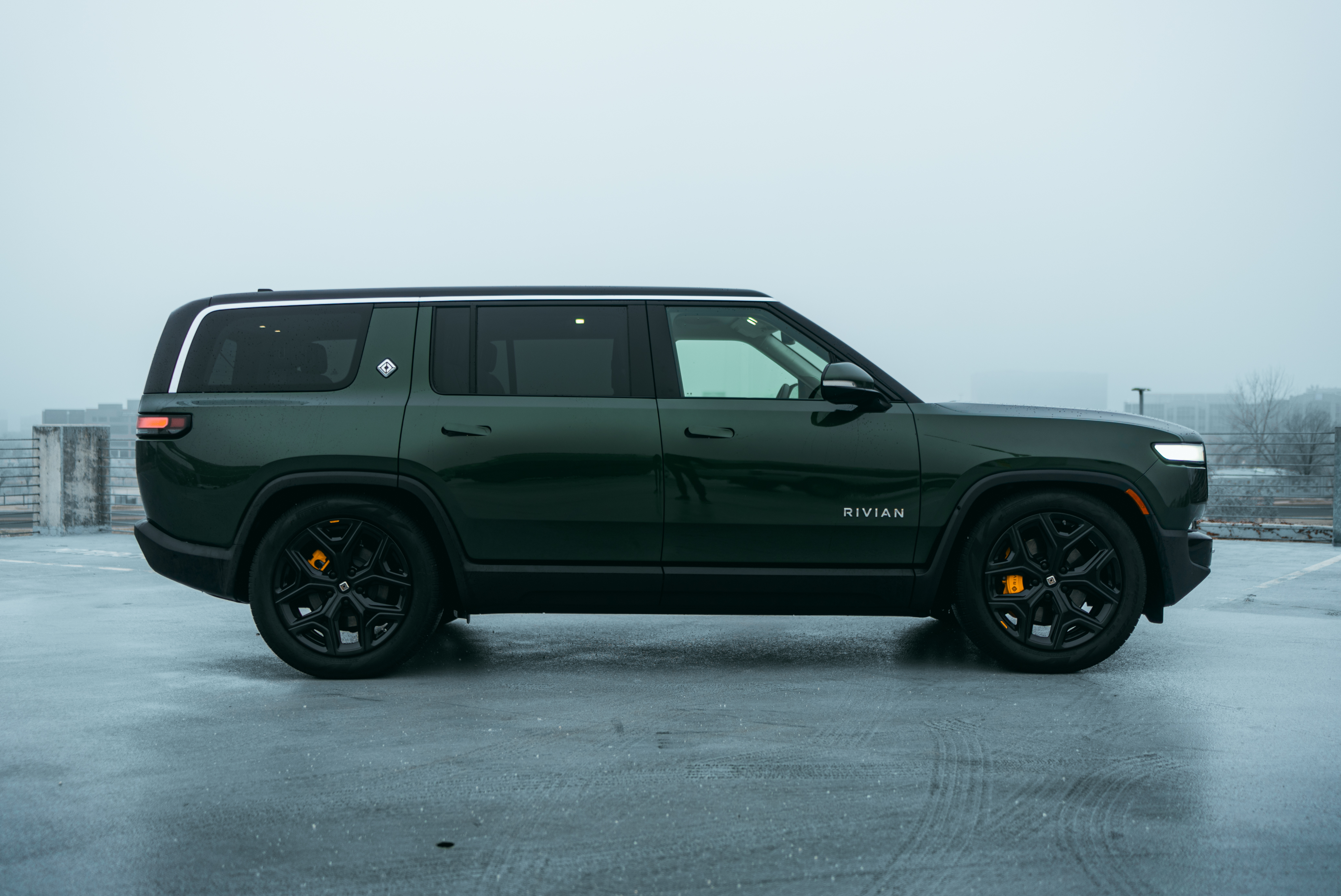 Green Rivian R1S side profile