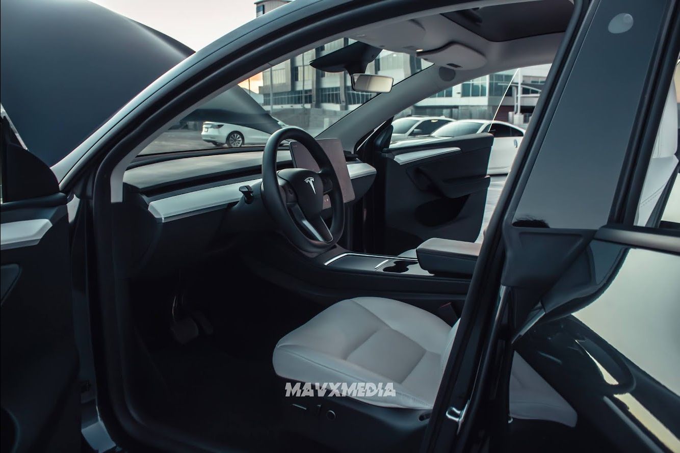 Tesla Model Y driver area and white interior